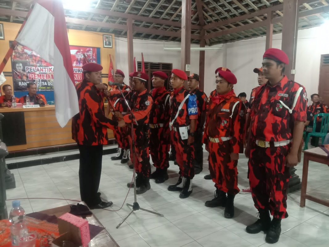 Prosesi pelantikan Pengurus Ranting Pemuda Pancasila se-Kecamatan Kalijambe